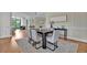 Bright dining room with hardwood floors and a modern dining table at 750 Park Ne Ave # 6E, Atlanta, GA 30326