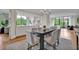 Open concept dining room with hardwood floors and a view into the kitchen at 750 Park Ne Ave # 6E, Atlanta, GA 30326