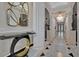Elegant hallway with marble floors and art deco accents at 750 Park Ne Ave # 6E, Atlanta, GA 30326
