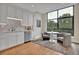 Cozy kitchenette with white cabinets, granite counters and a breakfast nook at 750 Park Ne Ave # 6E, Atlanta, GA 30326