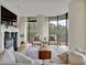 Modern living room with hardwood floors and fireplace at 750 Park Ne Ave # 6E, Atlanta, GA 30326