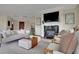 Elegant living room with fireplace and hardwood floors at 750 Park Ne Ave # 6E, Atlanta, GA 30326