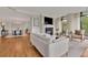 Open concept living room with hardwood floors and fireplace at 750 Park Ne Ave # 6E, Atlanta, GA 30326