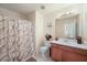 Clean bathroom with shower/tub combo and vanity at 4414 Parmalee Path, Conley, GA 30288