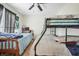 Small bedroom with bunk beds and window at 4414 Parmalee Path, Conley, GA 30288