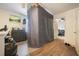 Small bedroom with divider curtain and dresser at 4414 Parmalee Path, Conley, GA 30288