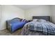 Spacious bedroom with a daybed and queen-size bed at 4414 Parmalee Path, Conley, GA 30288