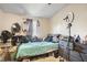 Small bedroom with full bed, dresser, and window at 4414 Parmalee Path, Conley, GA 30288