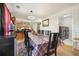 Dining area with a large table, access to kitchen and laundry area at 4414 Parmalee Path, Conley, GA 30288