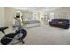 Large main bedroom with king bed and exercise bike at 4414 Parmalee Path, Conley, GA 30288