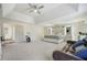 Spacious main bedroom with king bed and sitting area at 4414 Parmalee Path, Conley, GA 30288