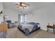 Cozy bedroom with a ceiling fan and plenty of natural light at 105 Ocee View Ct, Alpharetta, GA 30022