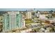 Aerial view of a modern highrise building in a vibrant city setting at 250 Pharr Rd # 712, Atlanta, GA 30305