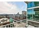 Balcony with city views and seating area at 250 Pharr Rd # 712, Atlanta, GA 30305