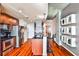 Modern kitchen with wood cabinets and granite countertops at 250 Pharr Rd # 712, Atlanta, GA 30305