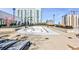 Empty swimming pool with lounge chairs on a rooftop deck at 250 Pharr Rd # 712, Atlanta, GA 30305