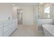 Elegant bathroom with soaking tub, walk-in shower, and modern vanity at 441 Pine Way, Dallas, GA 30157