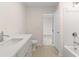 Bathroom with double vanity, toilet, and access to bedroom at 441 Pine Way, Dallas, GA 30157