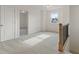 Open loft area with additional room and railing at 441 Pine Way, Dallas, GA 30157