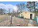 View of detached garage and spacious backyard at 3160 New Macland Rd, Powder Springs, GA 30127