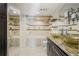Spa-like bathroom with a soaking tub, glass sinks, and granite vanity at 2870 Pharr Court South Nw # 1205, Atlanta, GA 30305