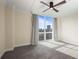 Bedroom with hardwood floors, city view, and ceiling fan at 2870 Pharr Court South Nw # 1205, Atlanta, GA 30305