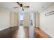 Spacious bedroom with hardwood floors, large windows, and city views at 2870 Pharr Court South Nw # 1205, Atlanta, GA 30305