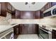 Updated kitchen with stainless steel appliances and granite countertops at 2870 Pharr Court South Nw # 1205, Atlanta, GA 30305