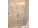 Updated bathroom with marble shower and pebble floor at 312 W Downing Ct, Jonesboro, GA 30238