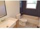 Updated bathroom, navy tile shower, new vanity at 312 W Downing Ct, Jonesboro, GA 30238