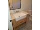 Bathroom vanity with a farmhouse sink and marble top at 312 W Downing Ct, Jonesboro, GA 30238