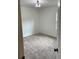 Bright bedroom with neutral walls and carpet at 312 W Downing Ct, Jonesboro, GA 30238