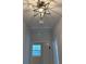 Bright hallway with a unique starburst light fixture at 312 W Downing Ct, Jonesboro, GA 30238