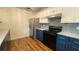 Modern kitchen with updated appliances and cabinetry at 312 W Downing Ct, Jonesboro, GA 30238