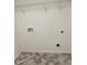 Laundry room with tile floors and ample shelving at 312 W Downing Ct, Jonesboro, GA 30238