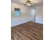 Bright living room featuring hardwood floors and recessed lighting at 312 W Downing Ct, Jonesboro, GA 30238