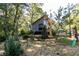 Gray modern home with small backyard and trees at 120 Howard Se St, Atlanta, GA 30317