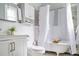 Elegant bathroom with clawfoot tub and shower at 120 Howard Se St, Atlanta, GA 30317