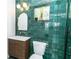 Stylish bathroom with a modern vanity and green tile at 120 Howard Se St, Atlanta, GA 30317