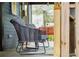 Relaxing front porch with wicker chairs and red swing at 120 Howard Se St, Atlanta, GA 30317