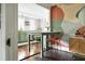 Modern kitchen with light green cabinets and a breakfast bar at 120 Howard Se St, Atlanta, GA 30317
