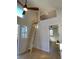 Open loft area with ladder access and ceiling fan at 120 Howard Se St, Atlanta, GA 30317