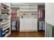 Spacious walk-in closet with ample shelving and hanging space at 1793 Glenaire Se Ct, Atlanta, GA 30316