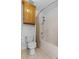 Bathroom with a shower/tub combo and built-in cabinet at 234 Hampton Shores Dr, Hampton, GA 30228