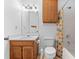 Bathroom with shower/tub combo and wood vanity at 234 Hampton Shores Dr, Hampton, GA 30228