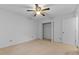 Spacious bedroom with ceiling fan and closet at 234 Hampton Shores Dr, Hampton, GA 30228