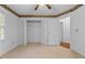 Bright bedroom with sunflower border and closet at 234 Hampton Shores Dr, Hampton, GA 30228