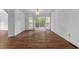 Bright dining room with hardwood floors and access to deck at 234 Hampton Shores Dr, Hampton, GA 30228
