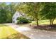 Long driveway leading to a charming house at 234 Hampton Shores Dr, Hampton, GA 30228