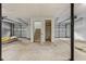 Two-car garage with extra storage and stairs to the house at 234 Hampton Shores Dr, Hampton, GA 30228